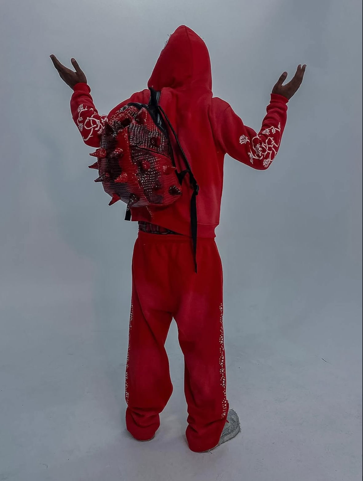 Red “Flourish.” Zipup
